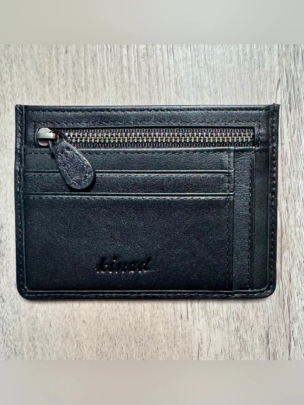 Kinzd minimalist leather card holder by Kinzd, featuring a zippered compartment